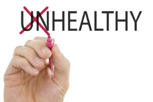 Changing word Unhealthy into Healthy by crossing off letters UN.